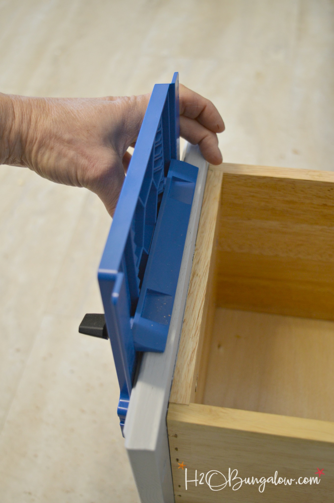 How to to install knobs and pulls on cabinets and furniture like a pro with a simple inexpensive tool that lines up everything perfectly for you. All you'll need is a drill. Find over 450 projects and ideas to make your home pretty on H2OBungalow.com 