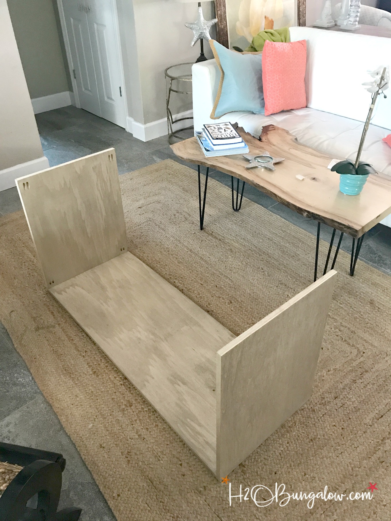 DIY media console with free plans tutorial. Build a media cabinet to hold electronics, add the matching wall mounted TV cabinet. Looks great in small spaces
