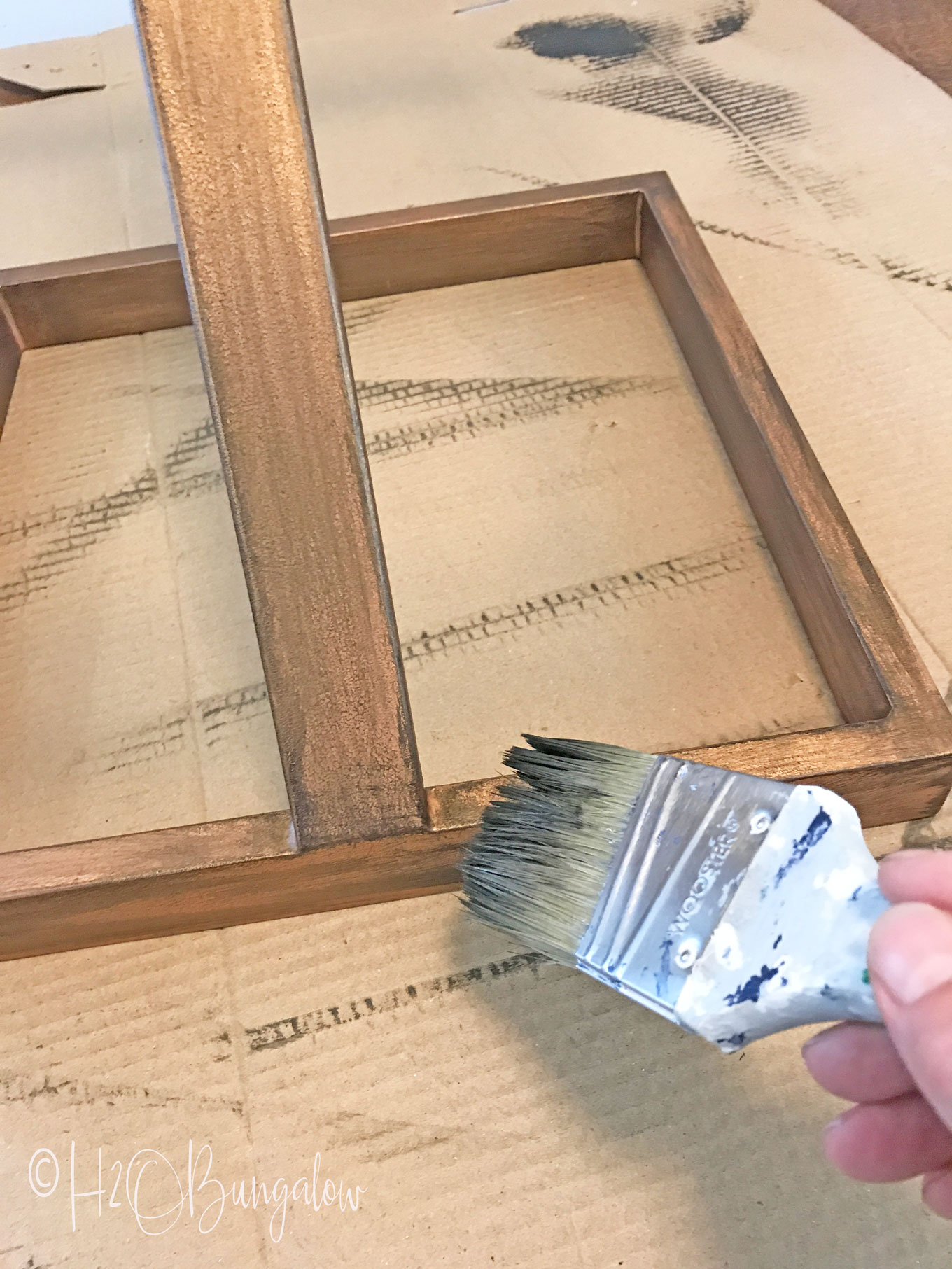 DIY tutorial to make a repurposed metal and wood side table from an old gold glass table into a wood and metal contemporary or rustic side table.