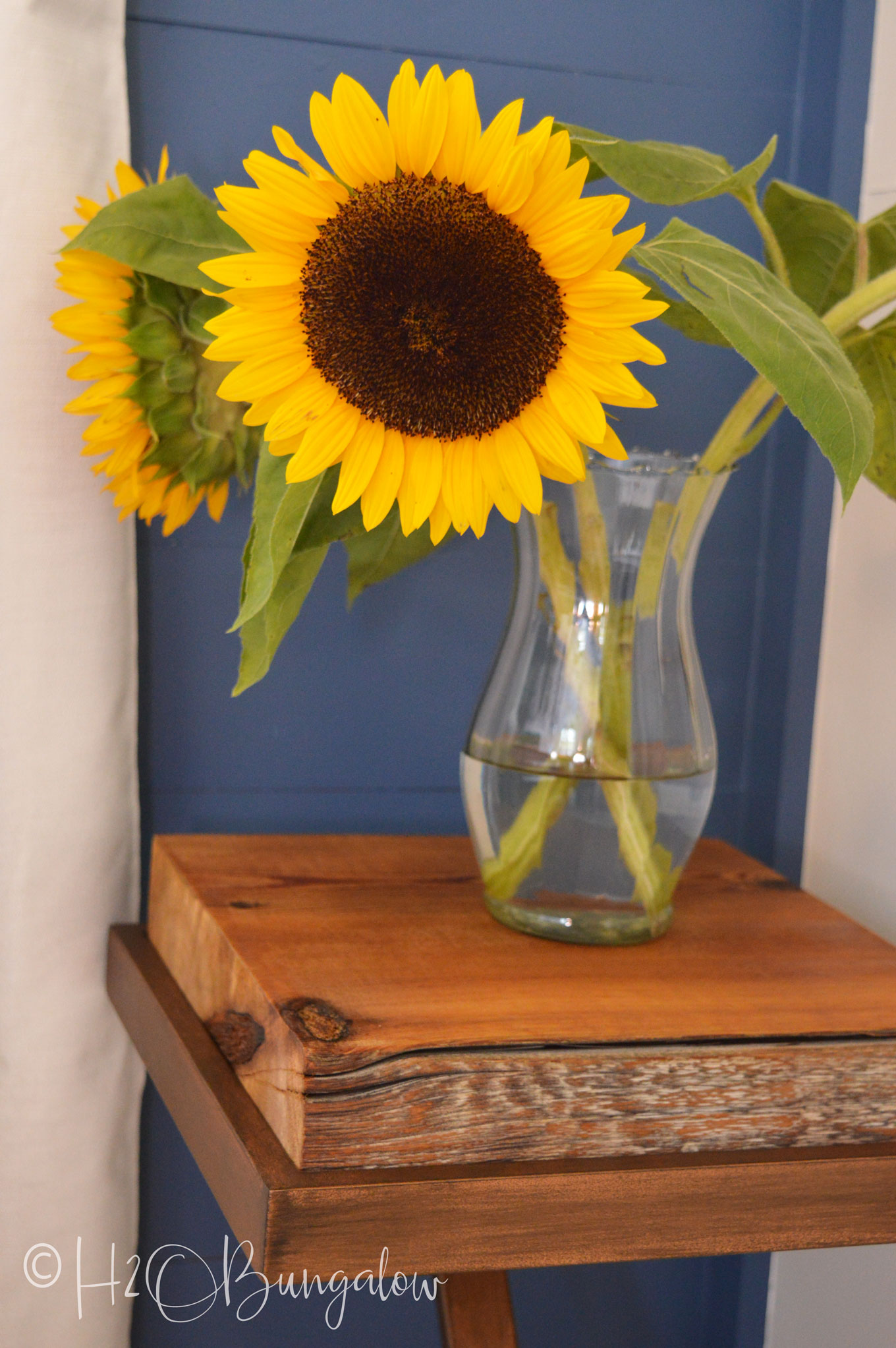 DIY tutorial to make a repurposed metal and wood side table from an old gold glass table into a wood and metal contemporary or rustic side table.