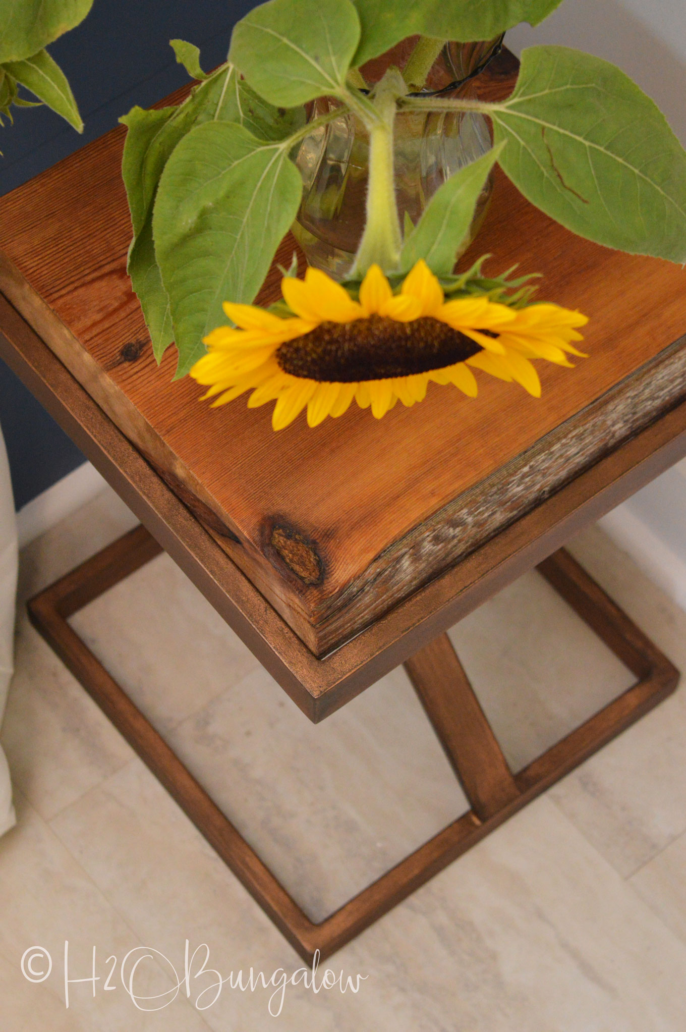 DIY tutorial to make a repurposed metal and wood side table from an old gold glass table into a wood and metal contemporary or rustic side table.