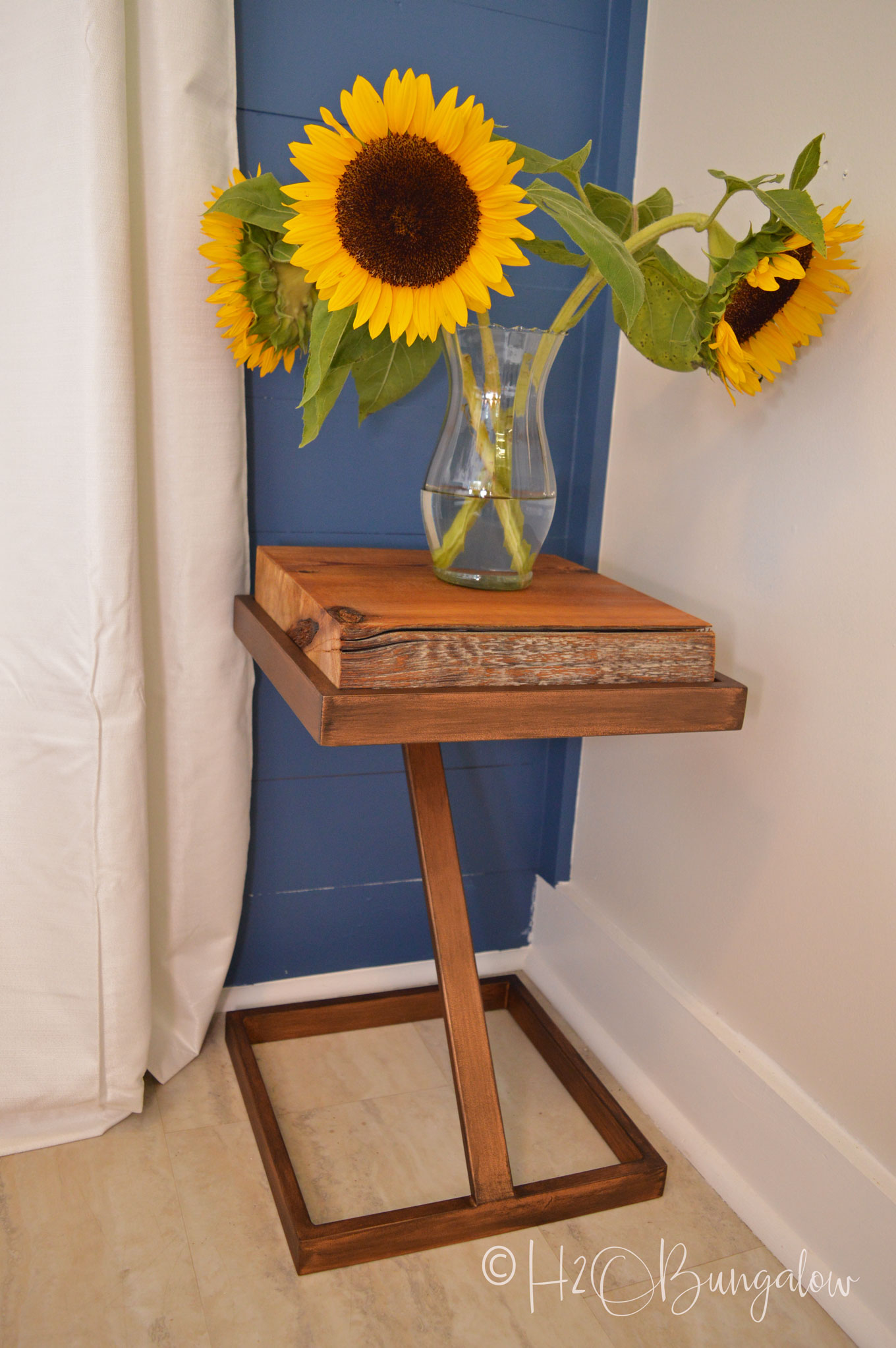 DIY tutorial to make a repurposed metal and wood side table from an old gold glass table into a wood and metal contemporary or rustic side table.