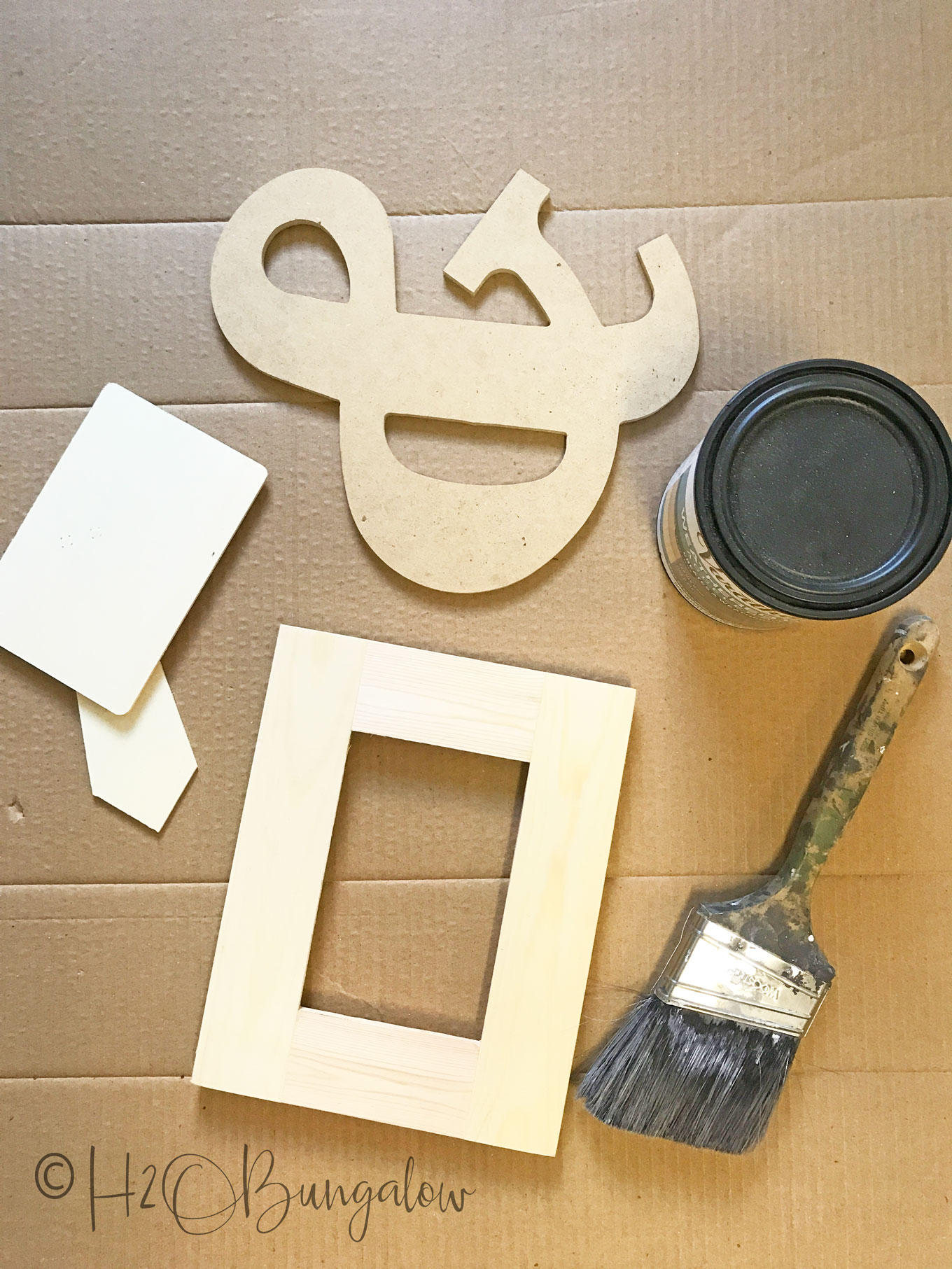 paint brush, glue, picture frame, ampersand 