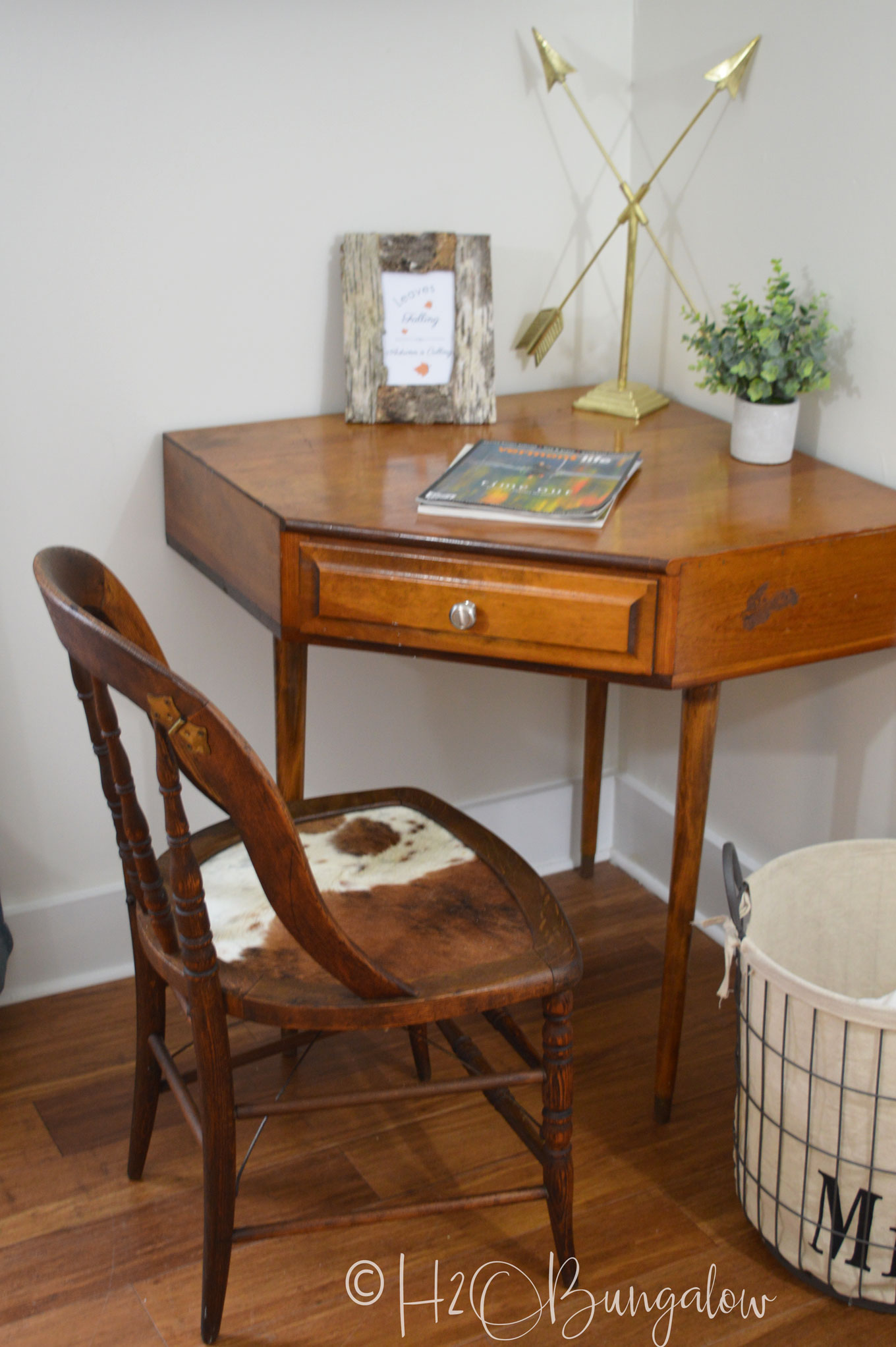 Tutorial for a cowhide chair makeover using real cowhide for the chair seat. Make this a fabulous accent chair with faux animal print or a cowhide. 