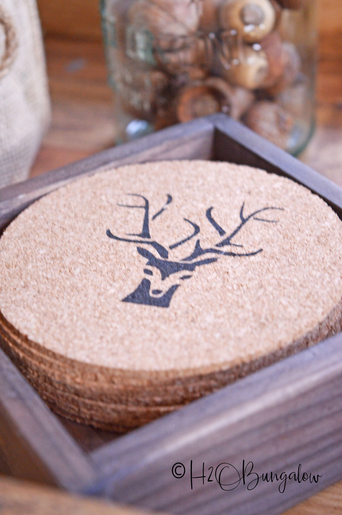 Closeup of deer antler stenciled cork coaster