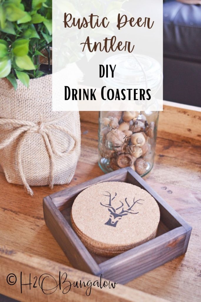 Rustic deer antler coasters sitting on table with plant . Image to pin to Pinterest 