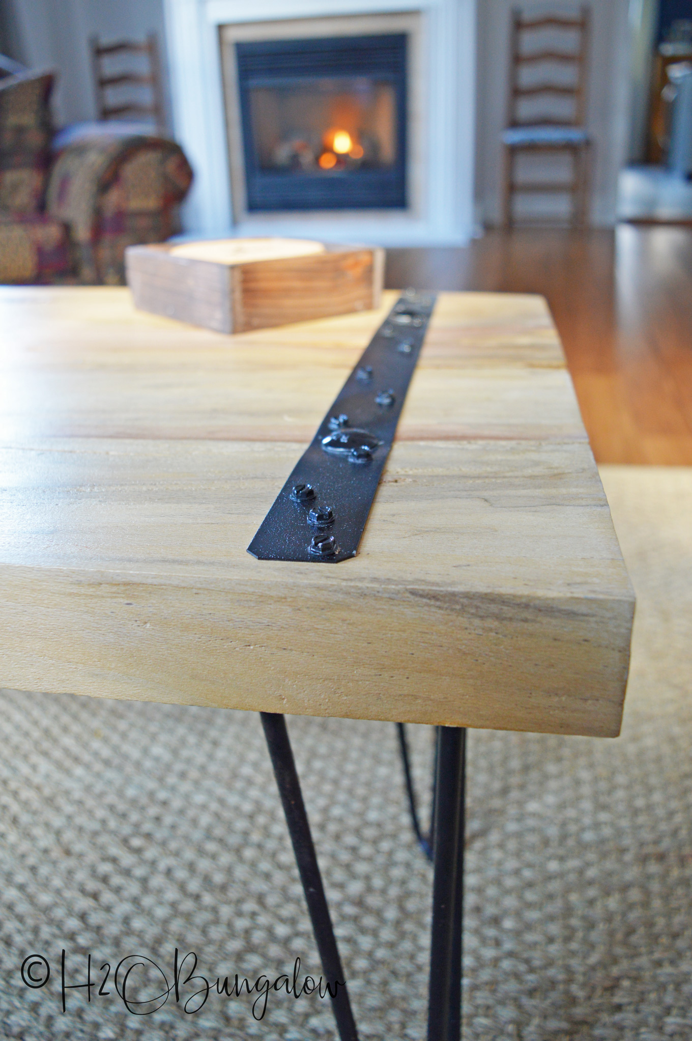 I'm loving the simplicity of this DIY rustic coffee table. I used two wide planks for the table top, but you could easily make a coffee table, or end tables with several wood boards or planks. Modify these DIY plans a little and it's an easy build requiring few tools and not a lot of time. 