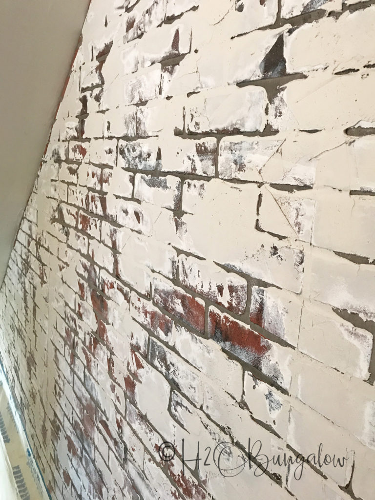 Stairwell wall with German schmear on the brick