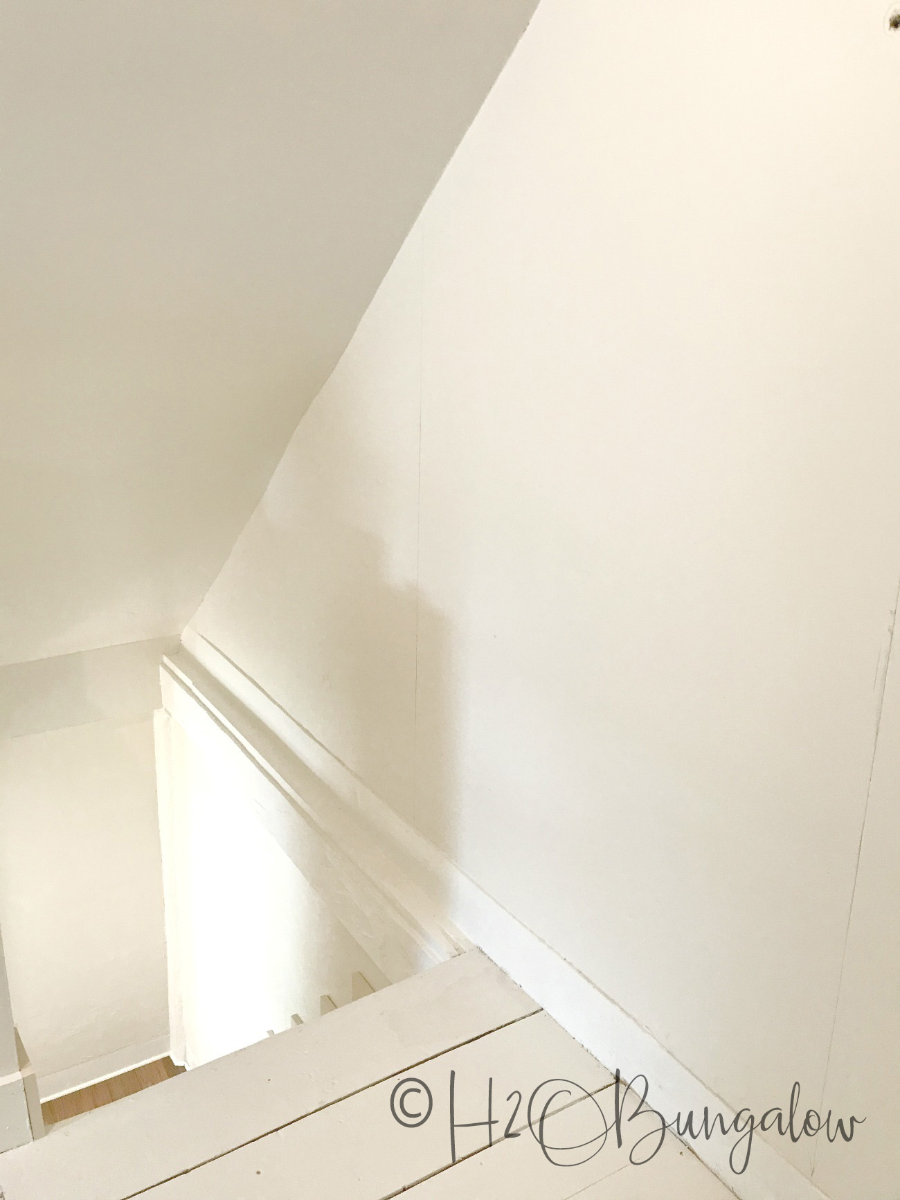 stairwell wall painted white