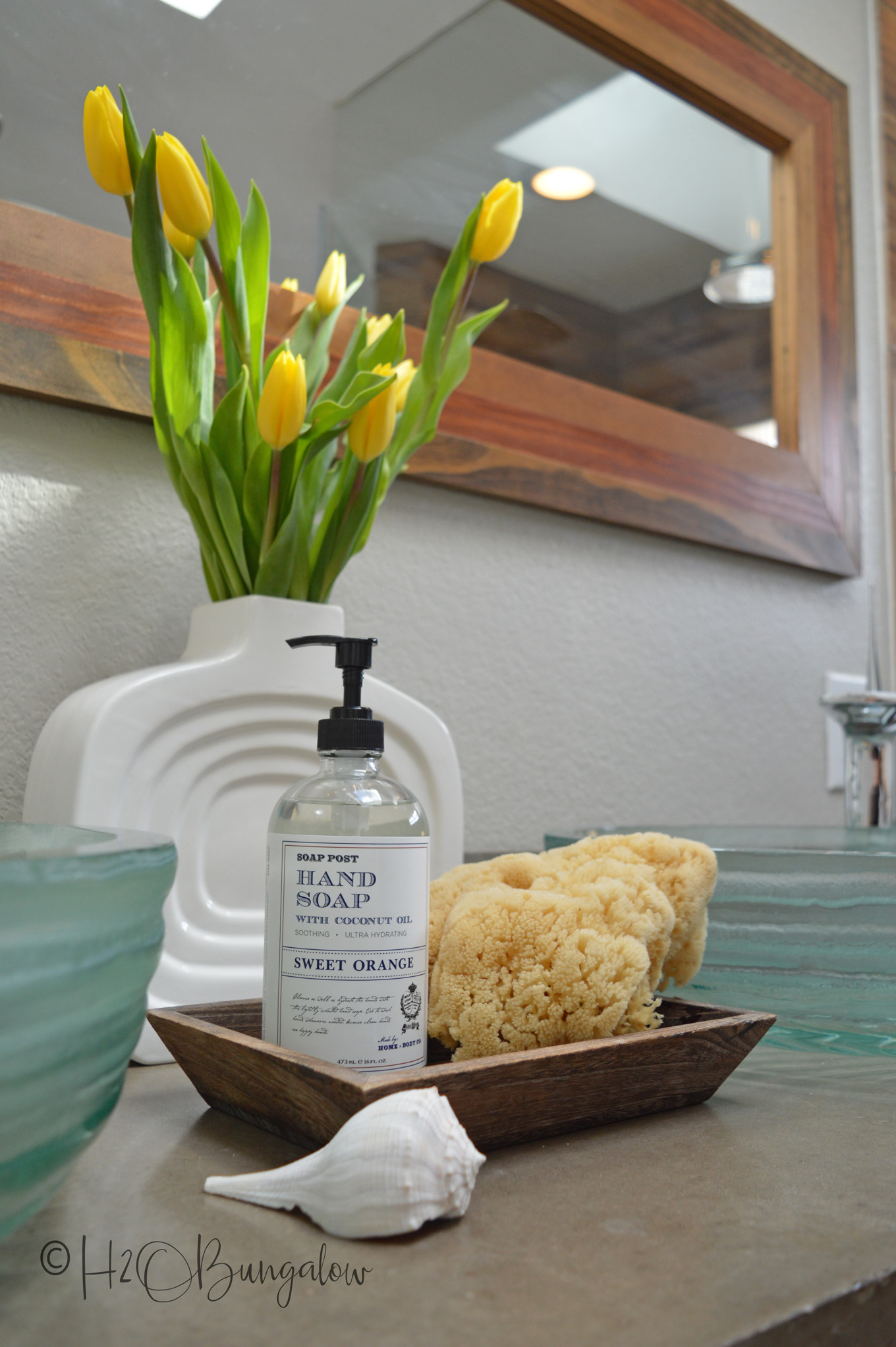 Today I want to share my spring master bath tour and mini makeover. Since we put in new skylights, the master bath was feeling tired. With a few simple changes and a little shopping, my coastal rustic master bath feels fresh and welcoming again. I point out the many awesome DIY projects that make this room special too! 