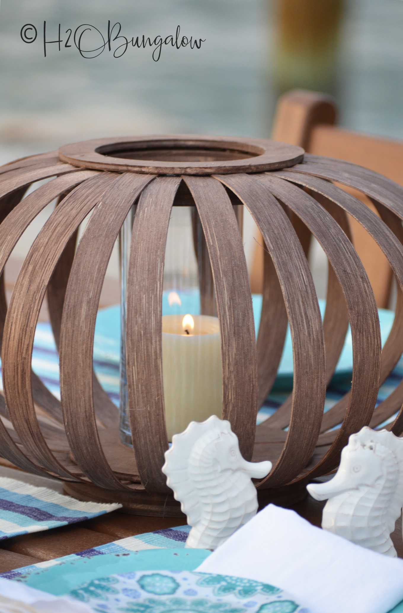 Close up of wooden lantern with candle.