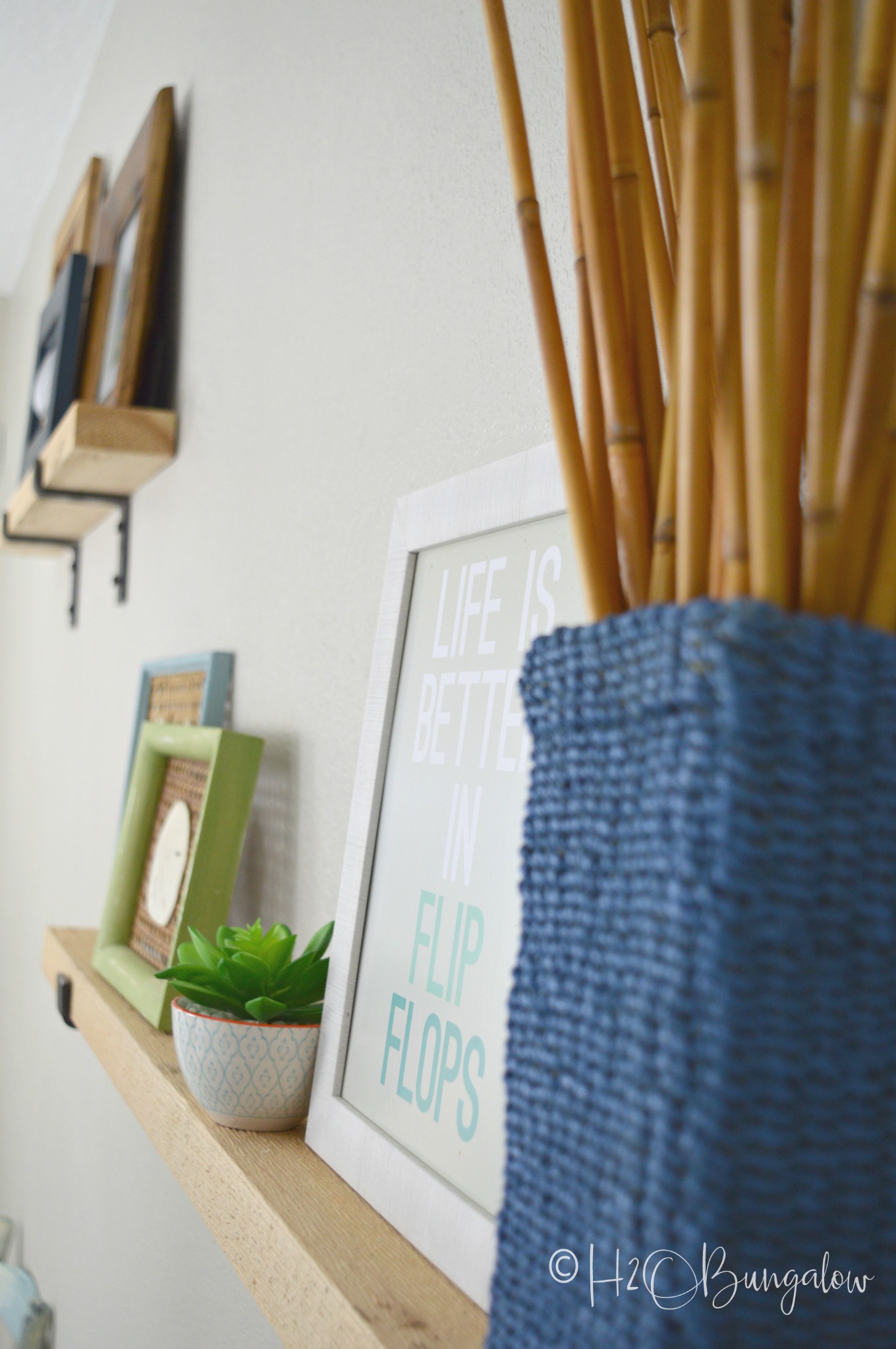 I'm so excited to share my modern coastal bedroom makeover with you guys today!  It's actually more of a redecorating bedroom refresh than a full blown makeover.  But, by changing the color palette,  adding a huge scrumptiously textured area rug and and few creative decor pieces it has the look of a whole new room.  This modern coastal bedroom makeover is fresh and contemporary while being warm and inviting.  Which is everything I'd want in a bedroom retreat.