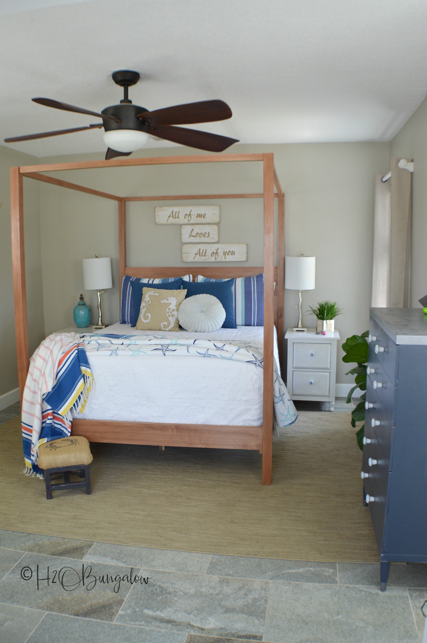 I'm so excited to share my modern coastal bedroom makeover with you guys today!  It's actually more of a redecorating bedroom refresh than a full blown makeover.  But, by changing the color palette,  adding a huge scrumptiously textured area rug and and few creative decor pieces it has the look of a whole new room.  This modern coastal bedroom makeover is fresh and contemporary while being warm and inviting.  Which is everything I'd want in a bedroom retreat.