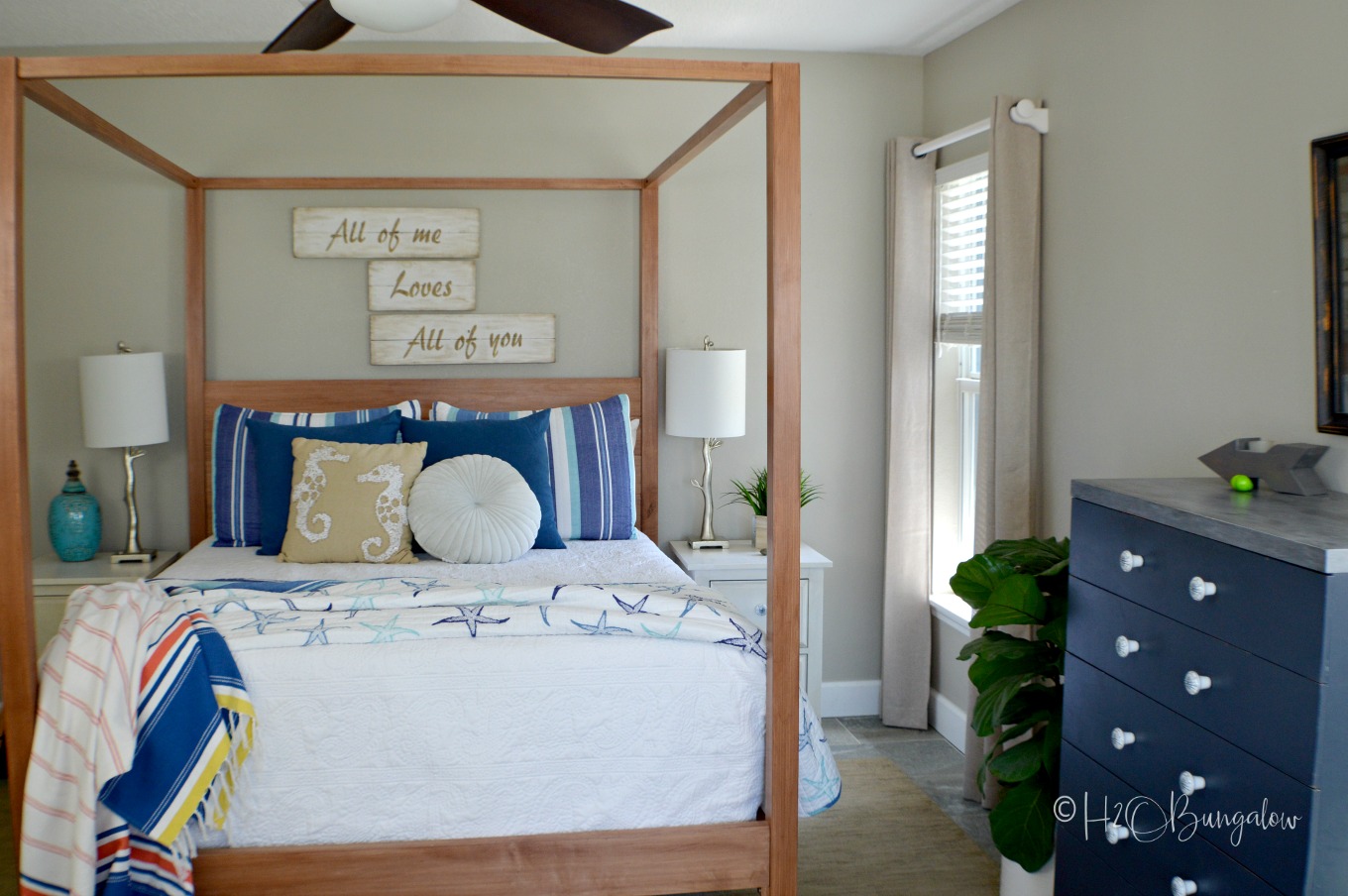 I'm so excited to share my modern coastal bedroom makeover with you guys today!  It's actually more of a redecorating bedroom refresh than a full blown makeover.  But, by changing the color palette,  adding a huge scrumptiously textured area rug and and few creative decor pieces it has the look of a whole new room.  This modern coastal bedroom makeover is fresh and contemporary while being warm and inviting.  Which is everything I'd want in a bedroom retreat.