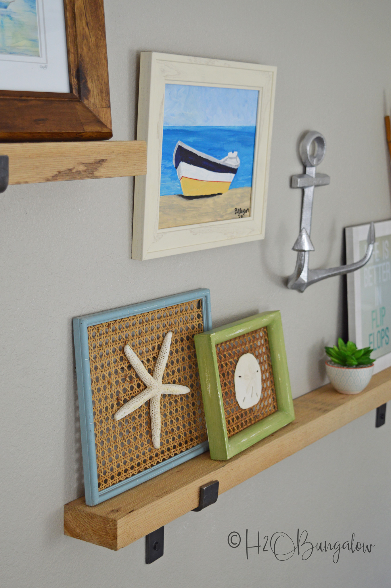 Tutorial on how to make a rustic modern DIY picture ledge and where to find the chunky industrial hardware.  Plus, simple step by step instructions on how to hang level picture ledges. Part 1 of 2, next learn how to create and style a wall vignette with picture ledges.