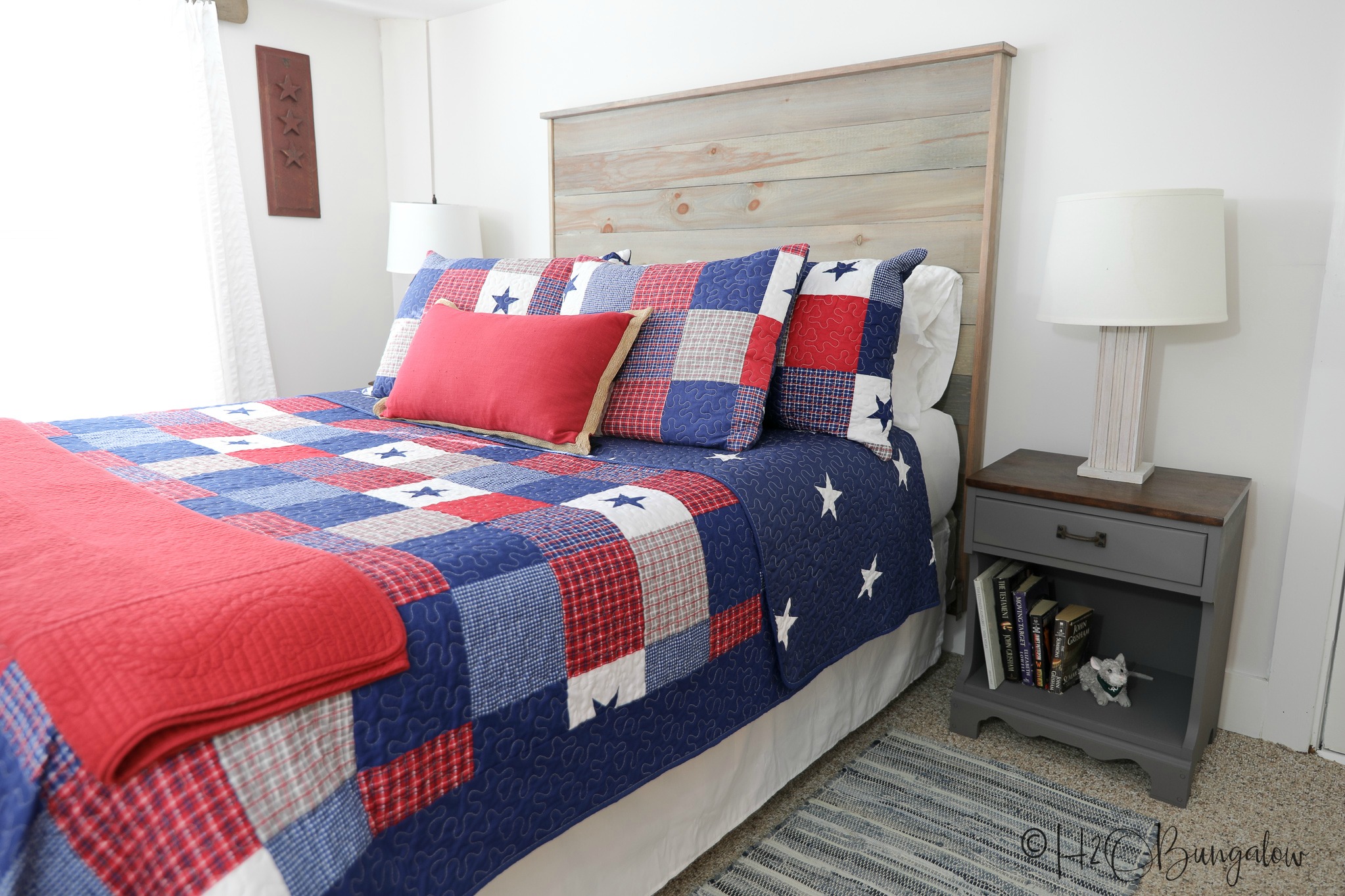 DIY rustic headboard tutorial with video to make a queen size wood headboard. Modify these plans for other bed sizes. Under $50 to make this modern headboard. 