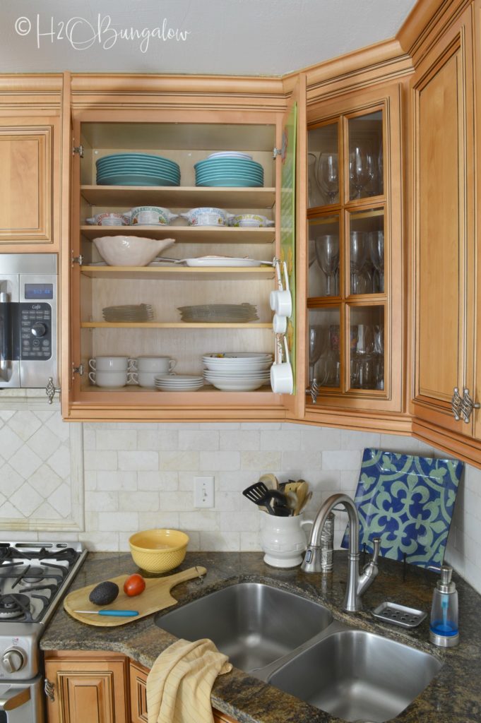 how to add extra shelves to kitchen cabinets - h2obungalow