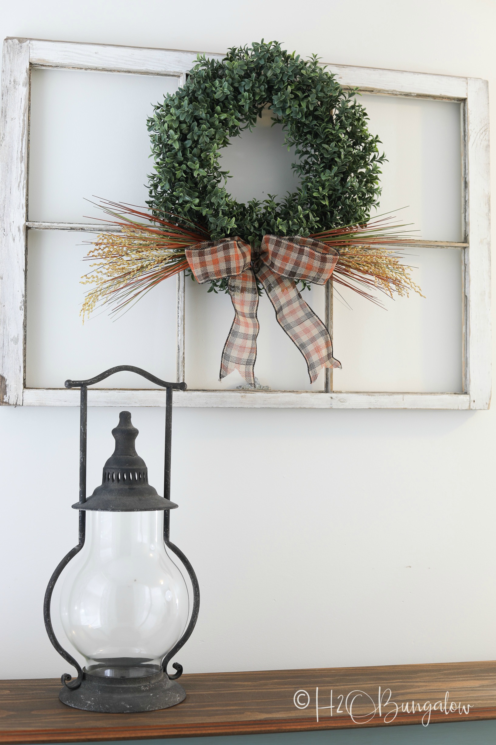 Make this easy fall boxwood wreath following my simple video tutorial. Quick and pretty fall decor for your front door or fireplace mantel. 