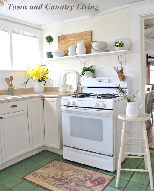 quaint country kitchen with open shelf