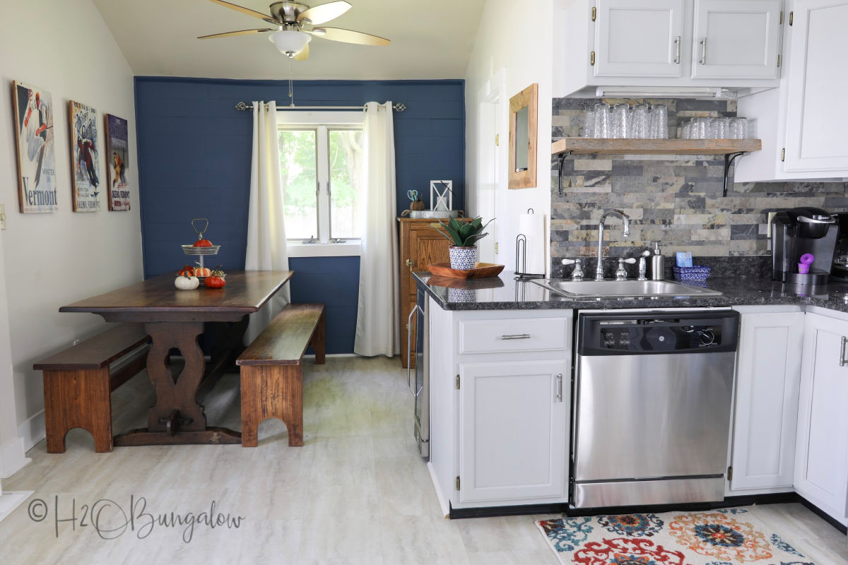 kitchen with slate peel and stick tile backsplash