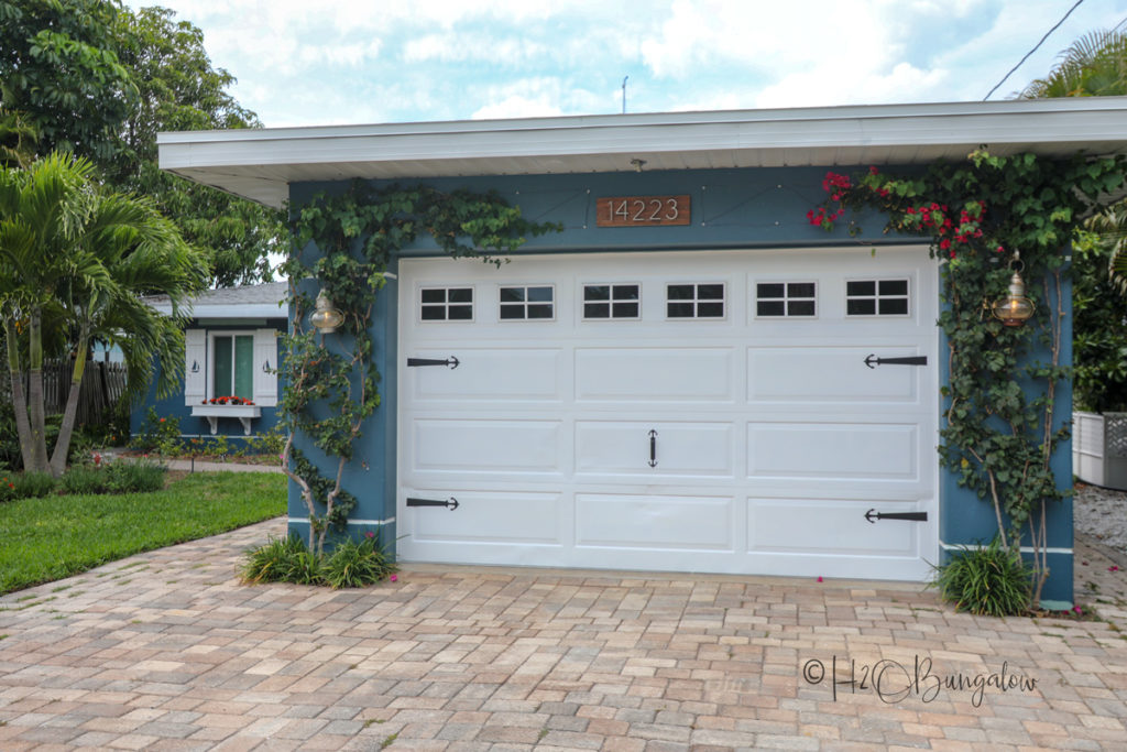 Faux garage windows and front of H2OBungalow coastal home tour 