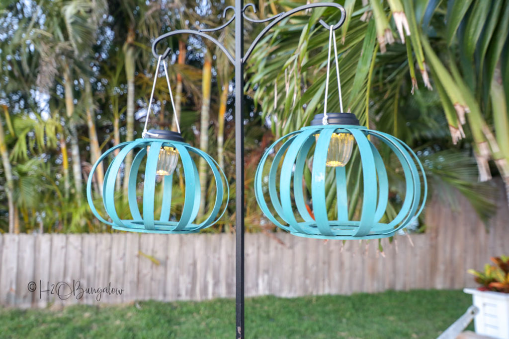 blue DIY solar hanging lanterns on shepherds hook