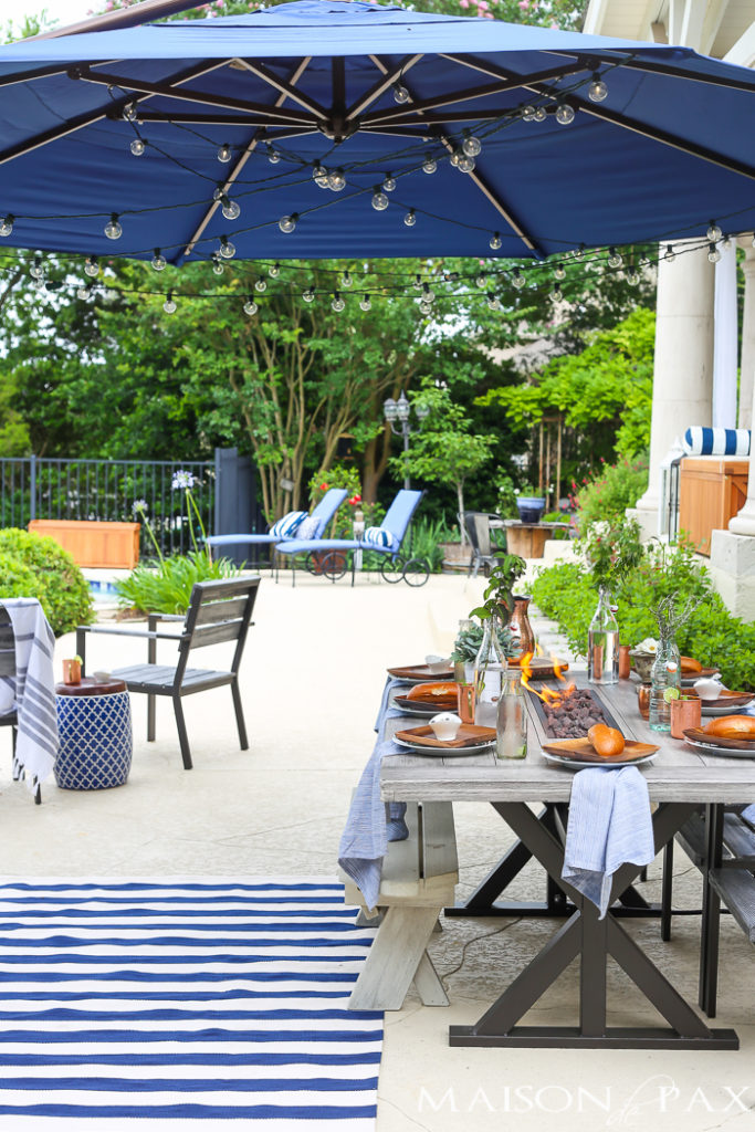 blue poolside outdoor dining area 