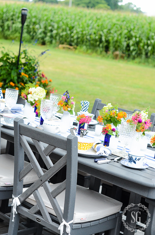 Colorful table setting with spring flowers 