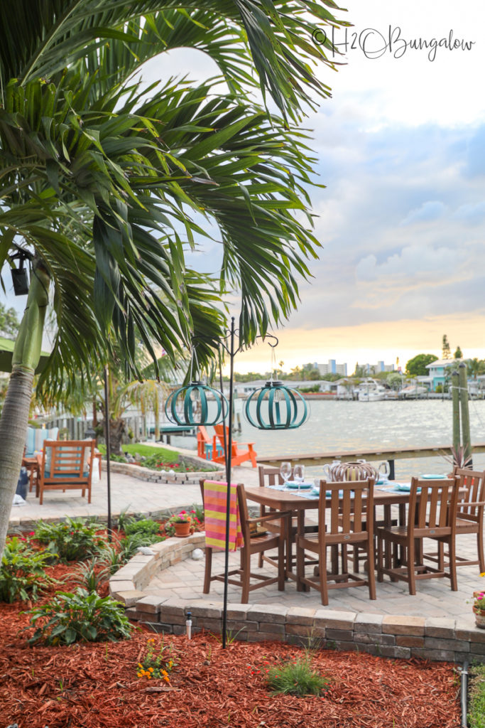 solar lanterns by outdoor dining table 