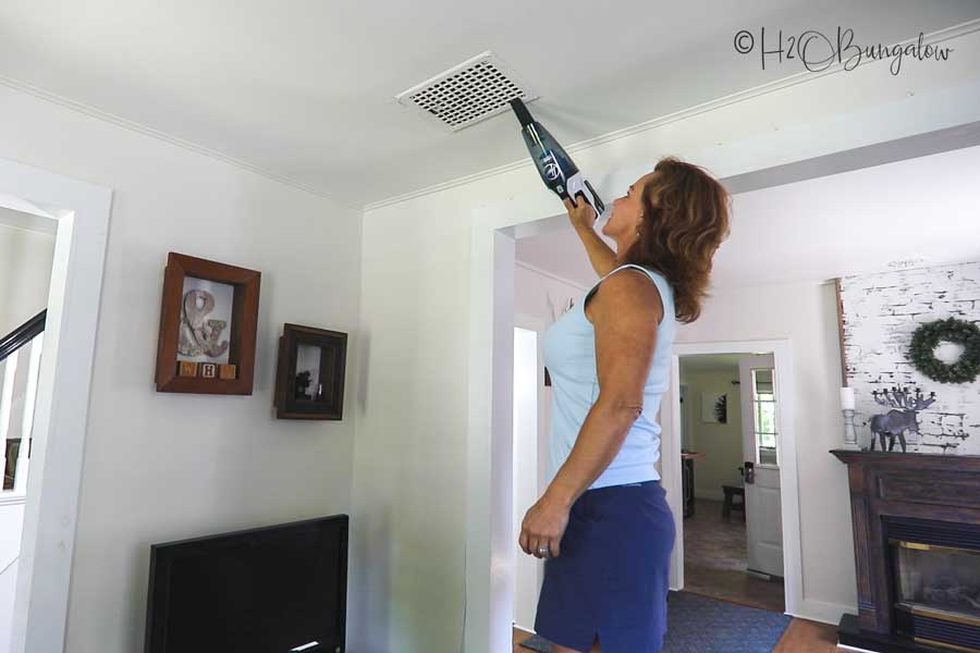 vacuuming ceiling vents deep clean a home 