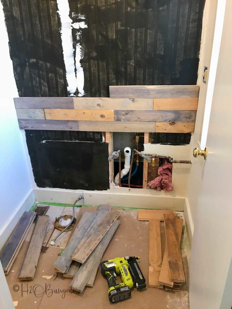 adding pallet wood to wall 