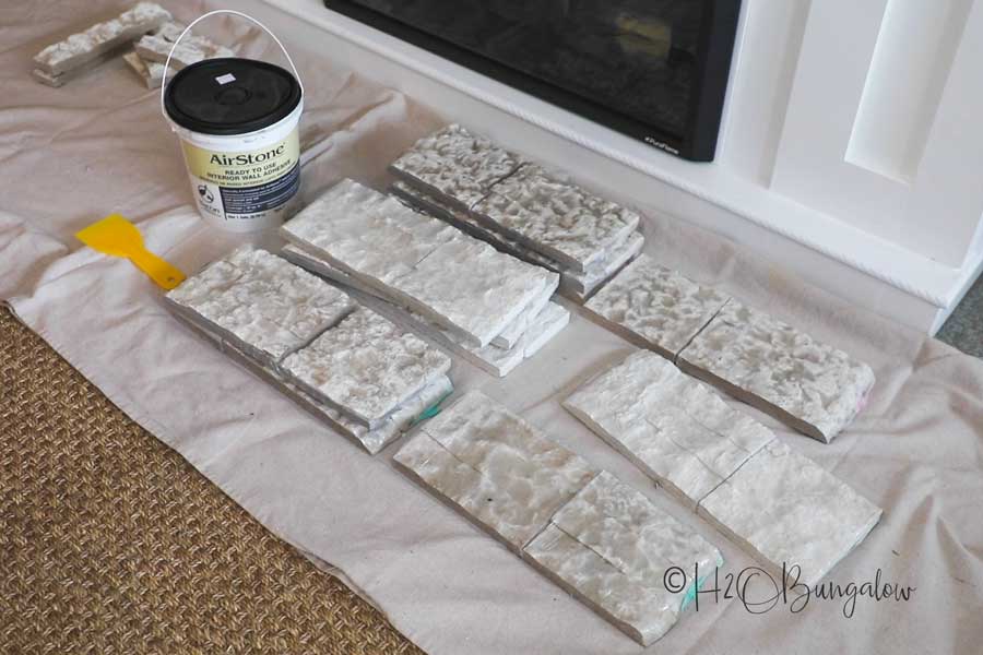 sort faux stones for stone fireplace surround 