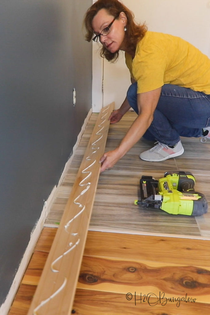 installing rustic molding in DIY mudroom