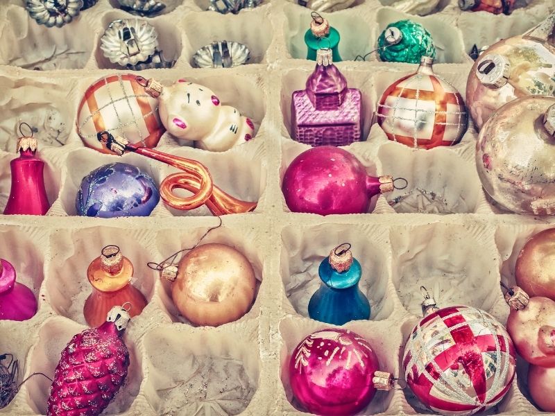 vintage colorful ornaments in an egg carton