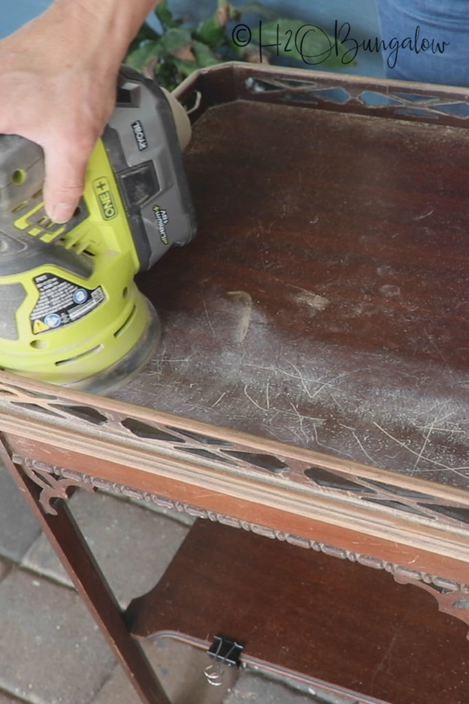 sanding tables to prep for painting over dark stained wood 