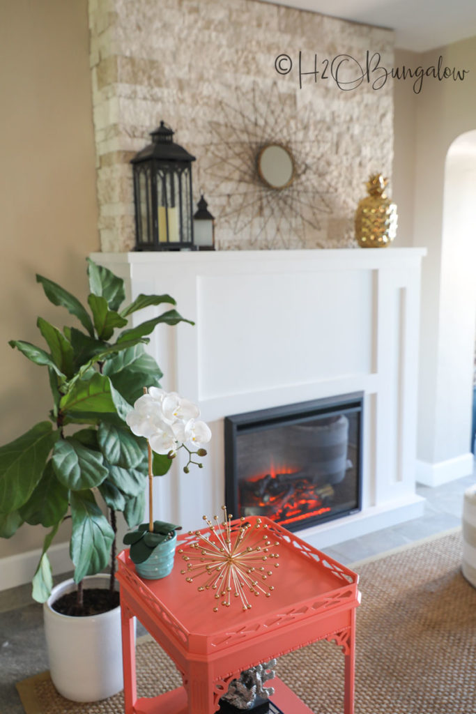 painted table by fireplace 