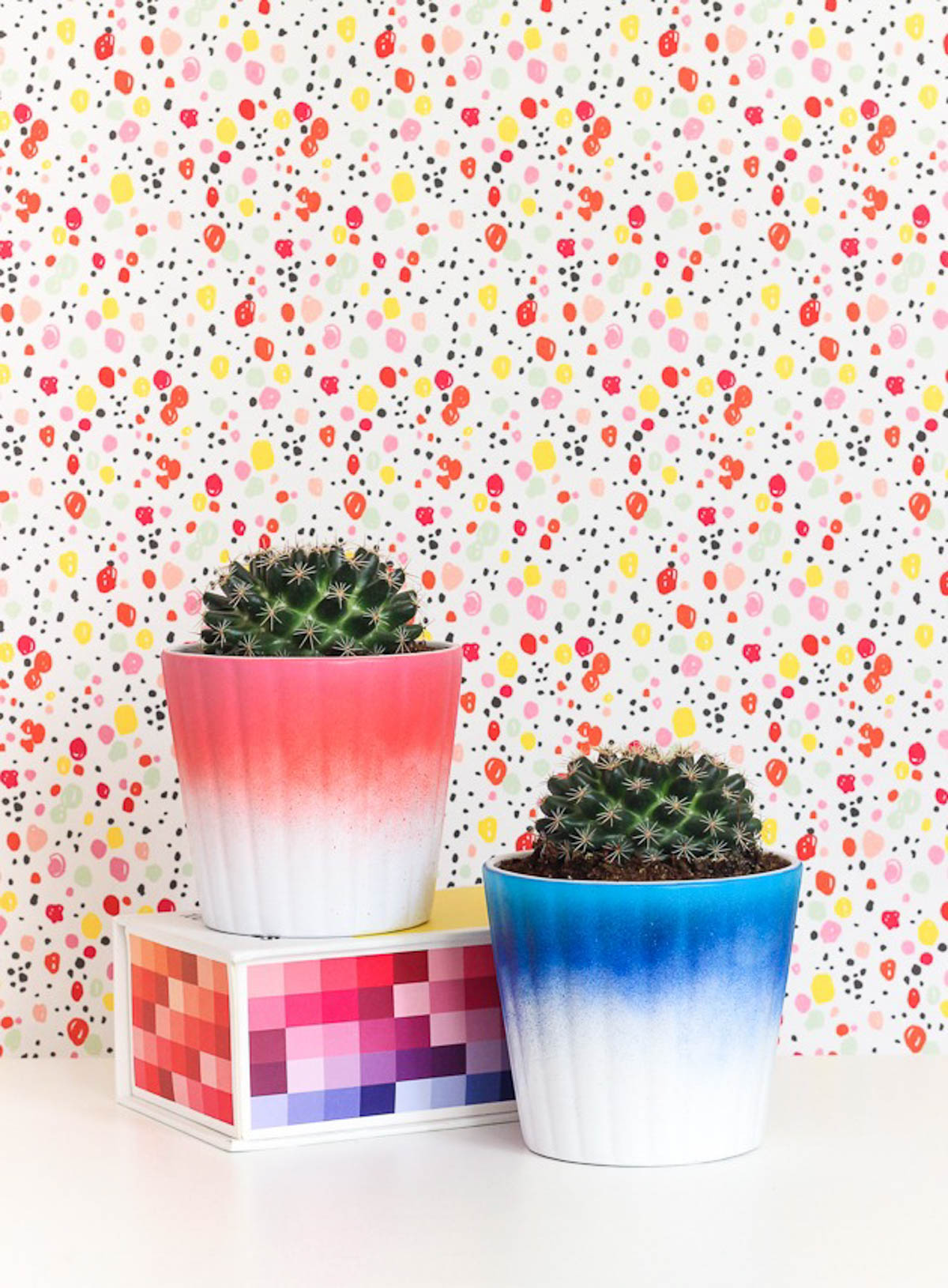 ombre spray painted planters in blue and pink