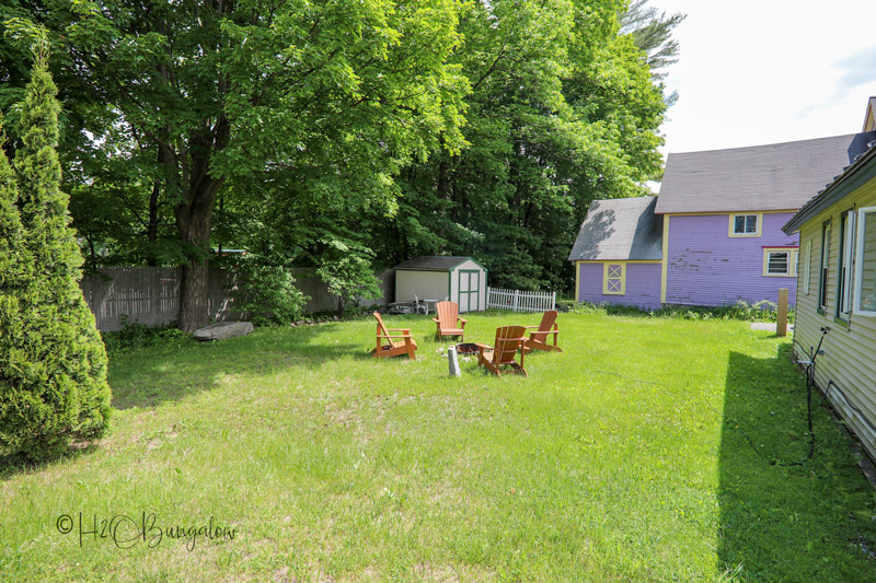 backyard before diy privacy fence was added