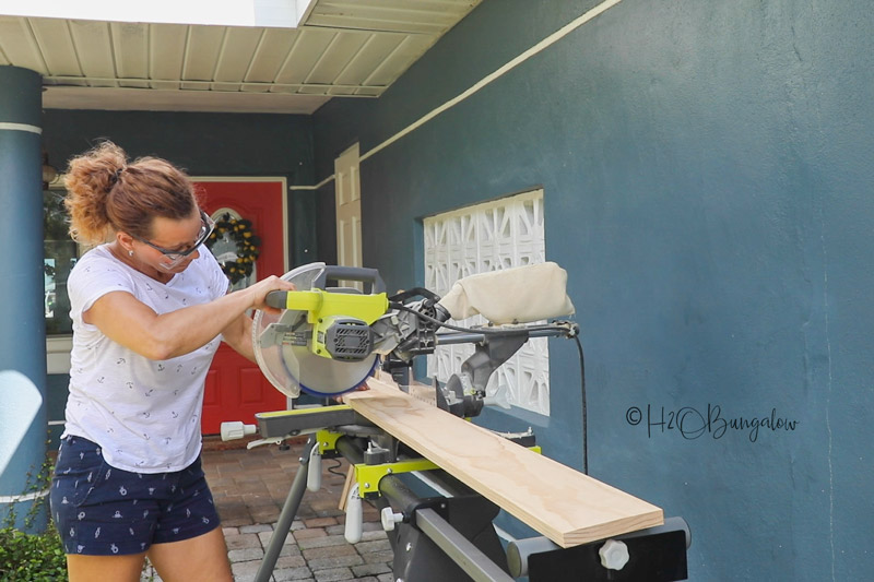 cutting wood with miter saw