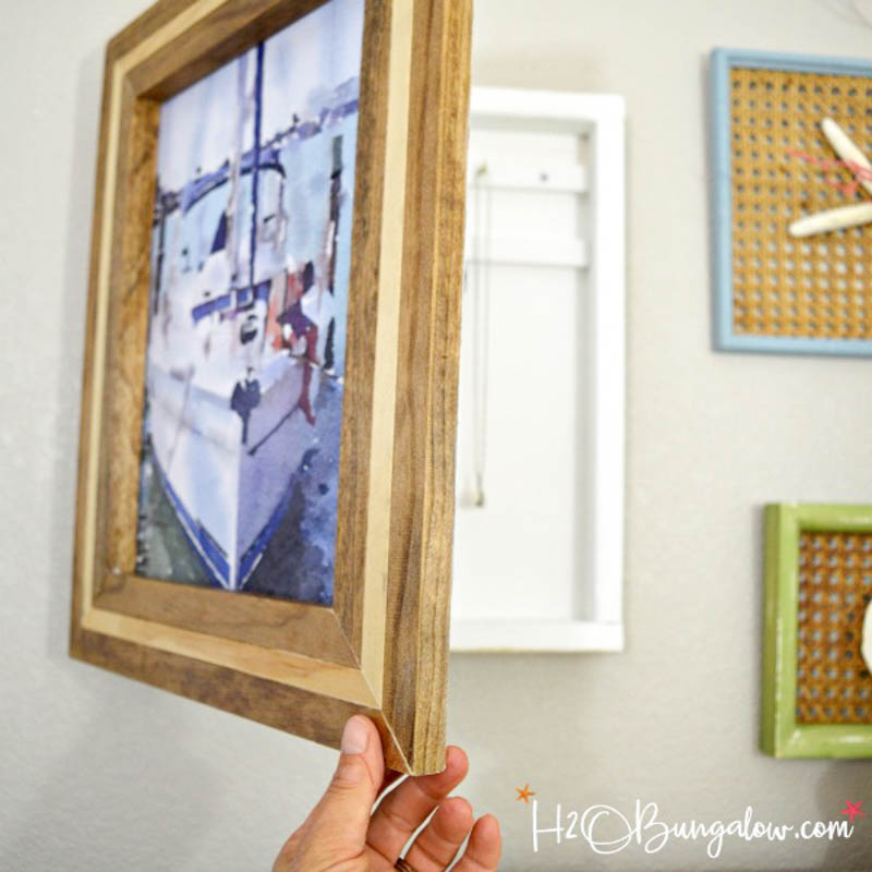 Hanging jewelry organizer with picture frame door 