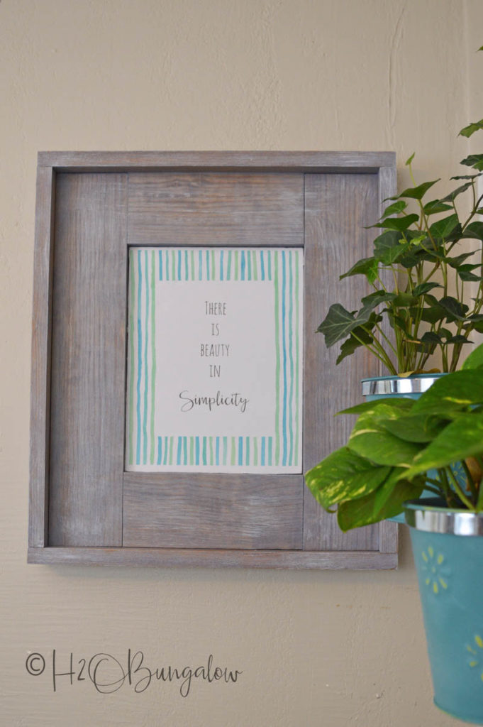 DIY rustic picture frame hanging on the wall 