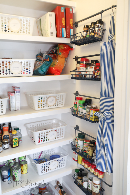 pantry organized for more space with bins 