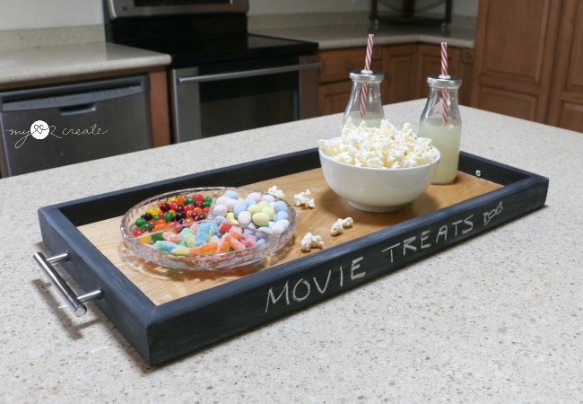 serving tray with chalkboard painted trim and popcorn in a bowl