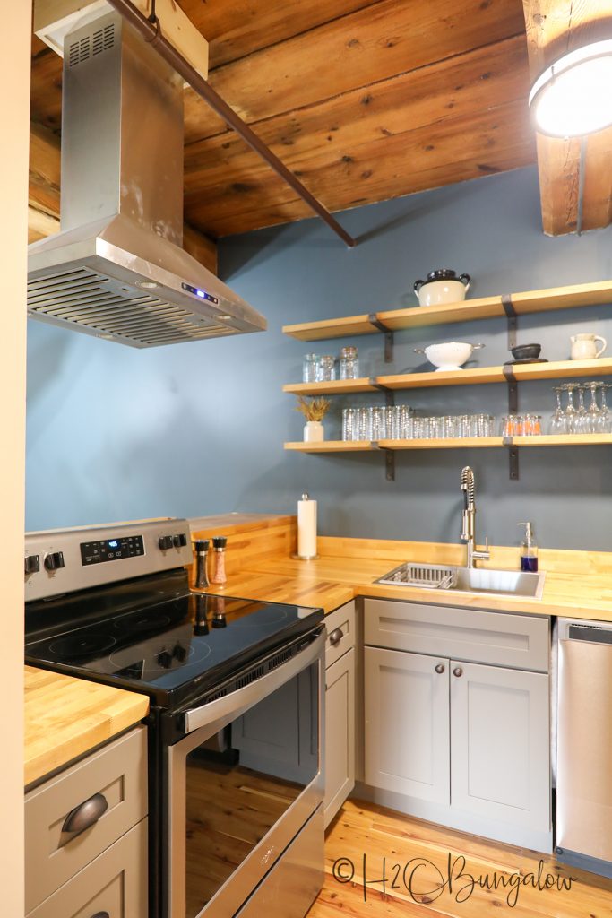 DIY wood countertop installed in rustic kitchen 