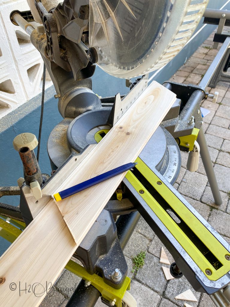 Cutting wood for hollow core door makeover with wood 