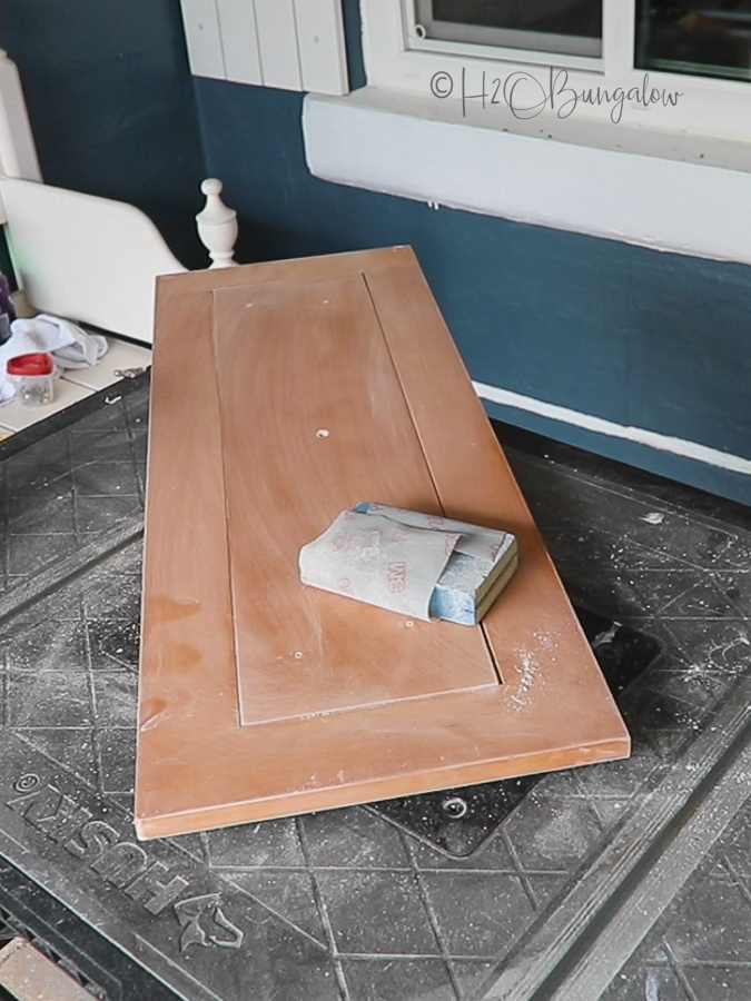 sanding kitchen island drawer before makeover