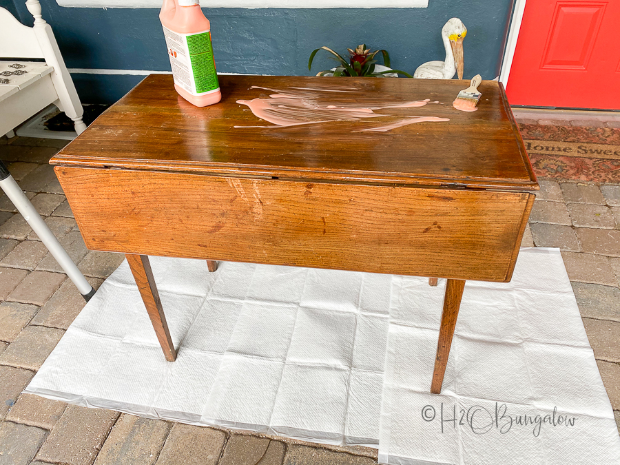 removing varnish from old table to bleach wood 
