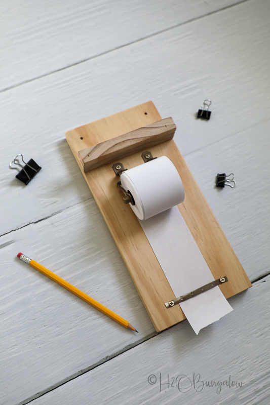 completed DIY paper roll noteholder for the wall 