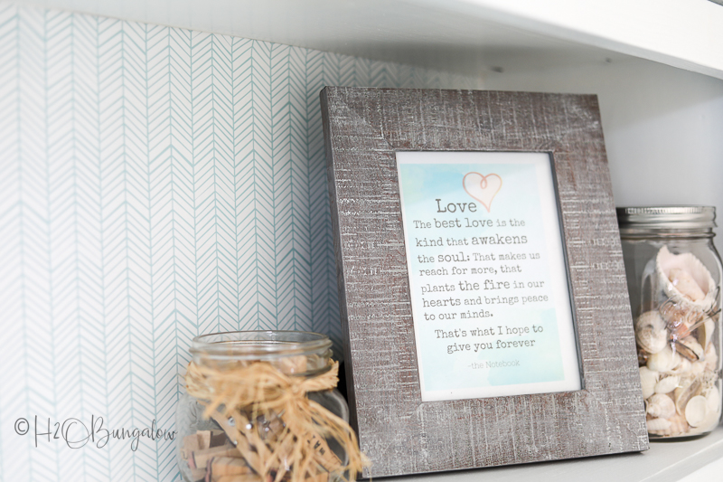 close up of removable peel and stick drawer and shelf liner on built in cabinet back 