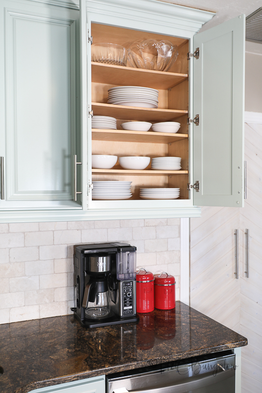 extra shelves in painted cabinet for dishes 